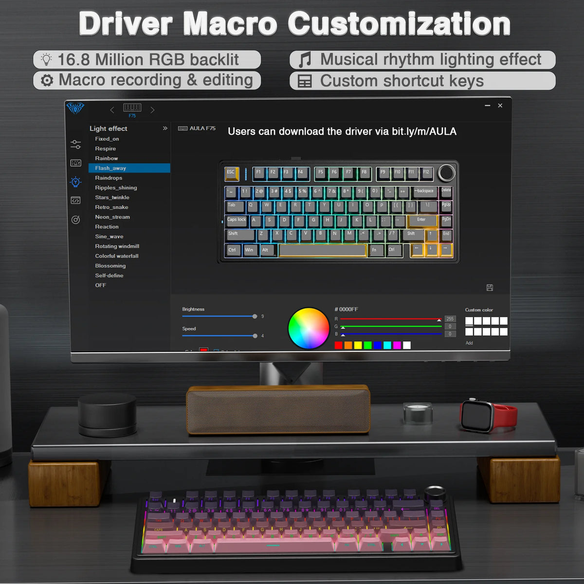 Computer monitor displaying driver macro customization software with a keyboard in front.