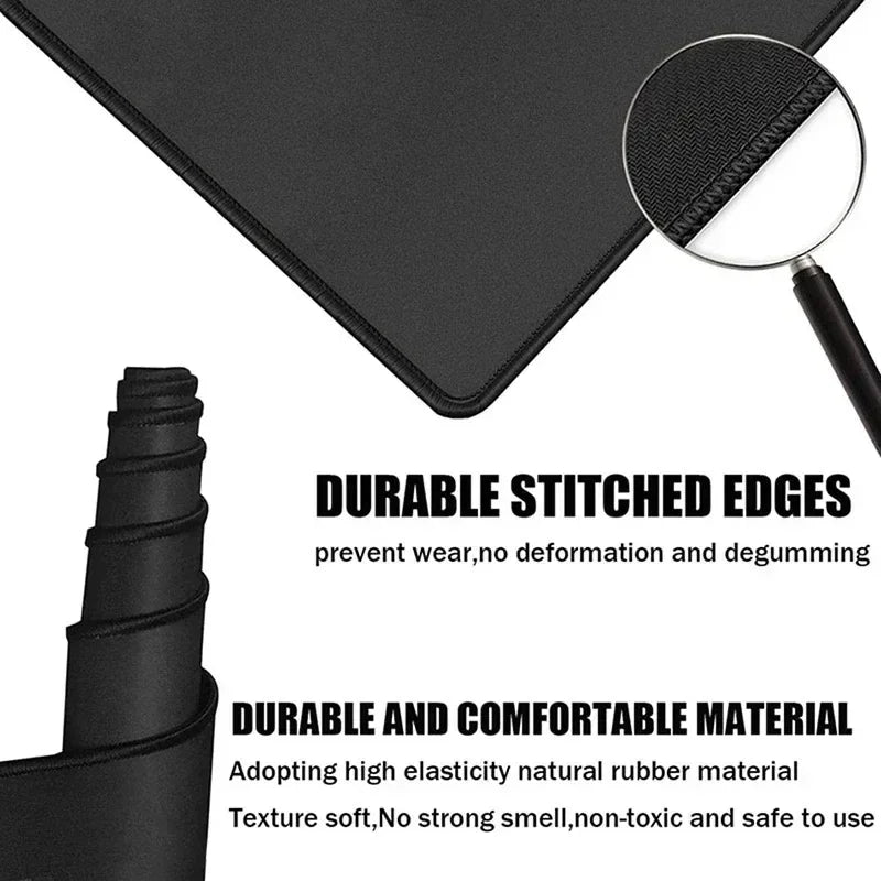 Mouse pad with magnifying glass showing edges with text durable stitiched edges to prevent wear, no deformation and degumming. Durable and comfortable material adopting high elasticity natural rubber material. Texture soft, no strong smell, non-toxic and safe to use.